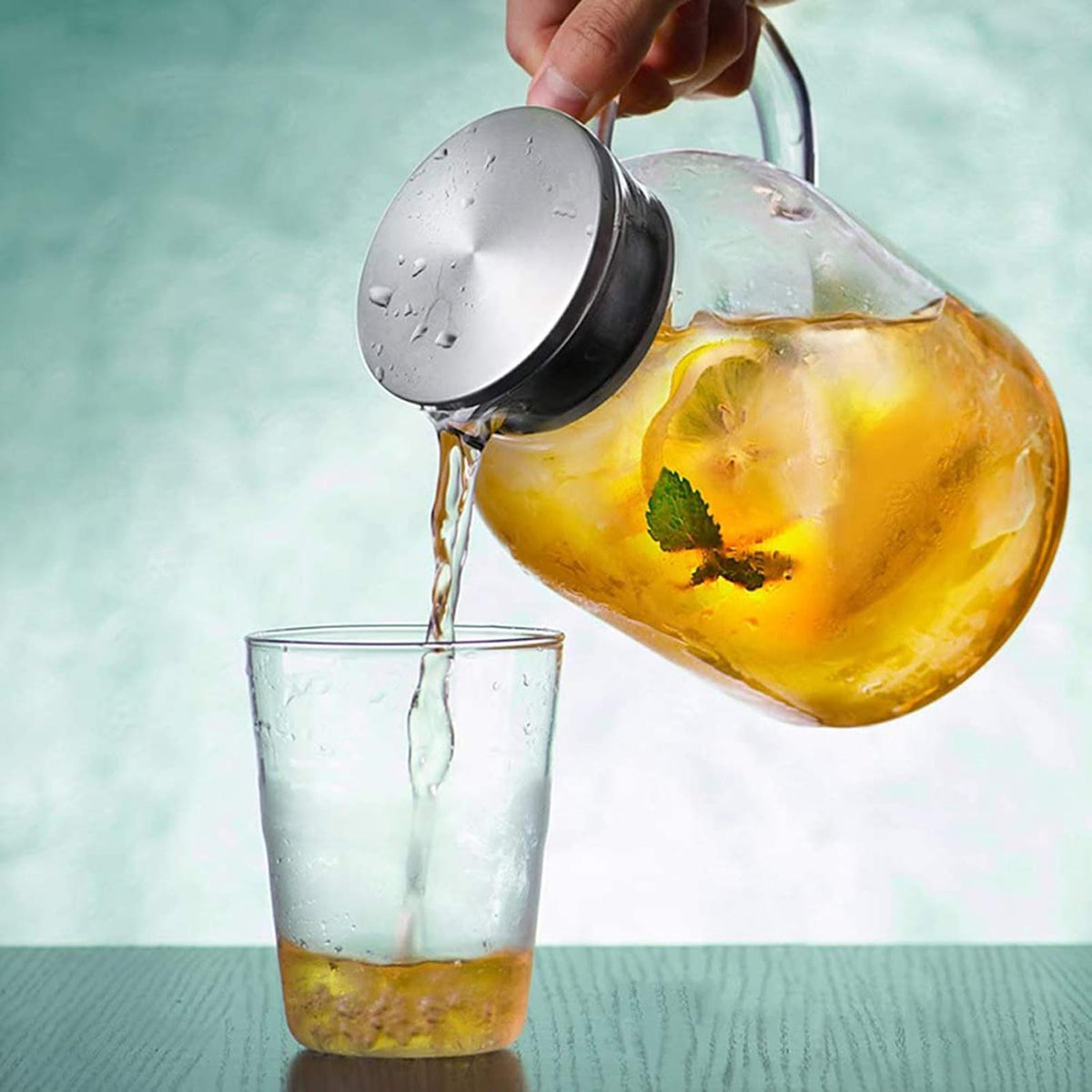 88oz Glass Pitcher with Lid and Handle - High Heat Resistance Glass Water Pitcher for Hot/Cold Water & Iced Tea (2.6L)