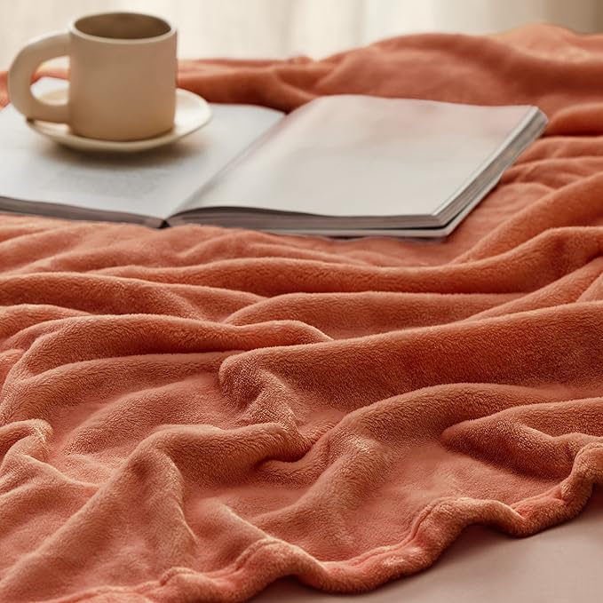 Bedsure Twin XL Fleece Blanket Dorm Bedding - Lightweight Soft Cozy Blankets for Bed, Sofa, Couch, Travel, Camping, Burnt Orange, 66"x90"